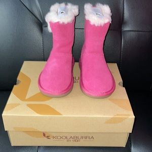 New Little girl Ugg . Little kids size 8 Pink colored Ugg Boots. Beautiful.